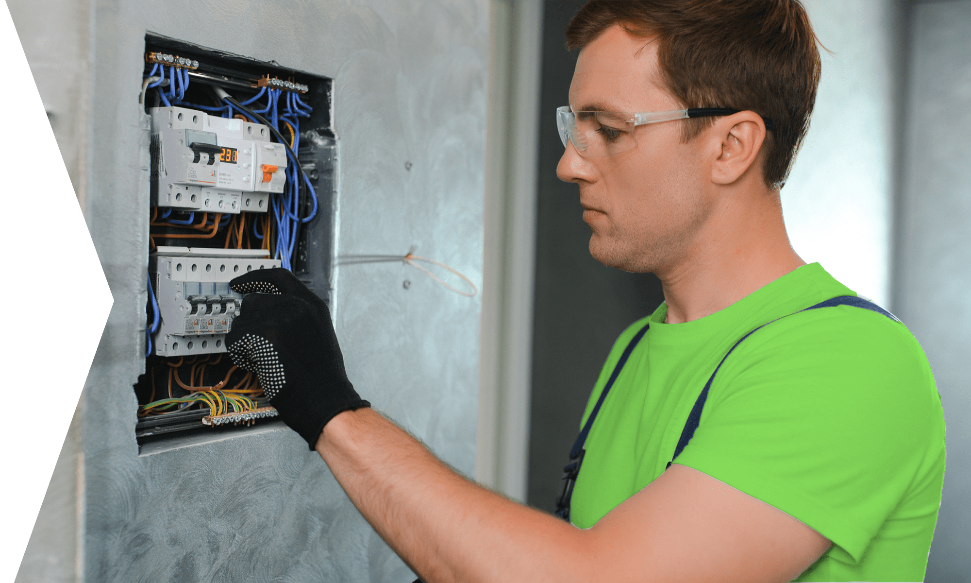 Electrician testing main panel